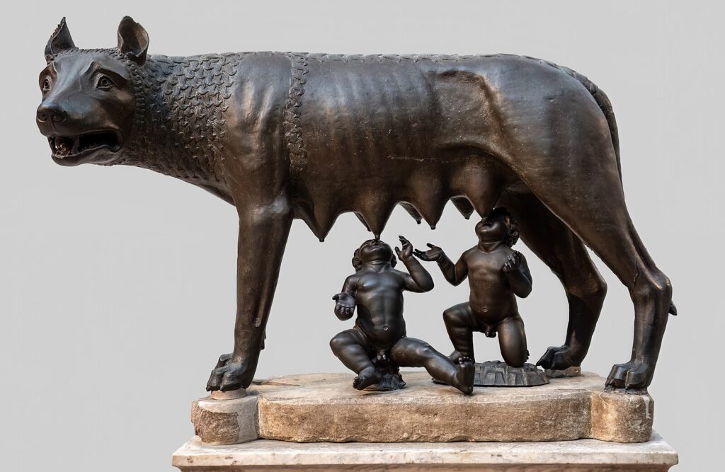 A bronze statue of the Capitoline Wolf nursing Romulus and Remus. 