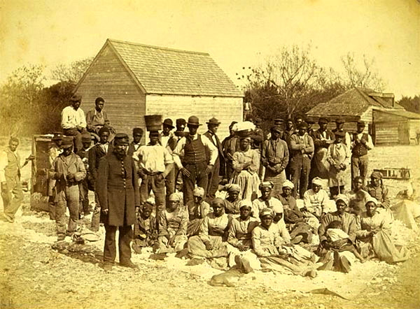 A group of people enslaved to the Confederate General Thomas Drayton, Hilton Head Island, South Carolina, in May 1862.